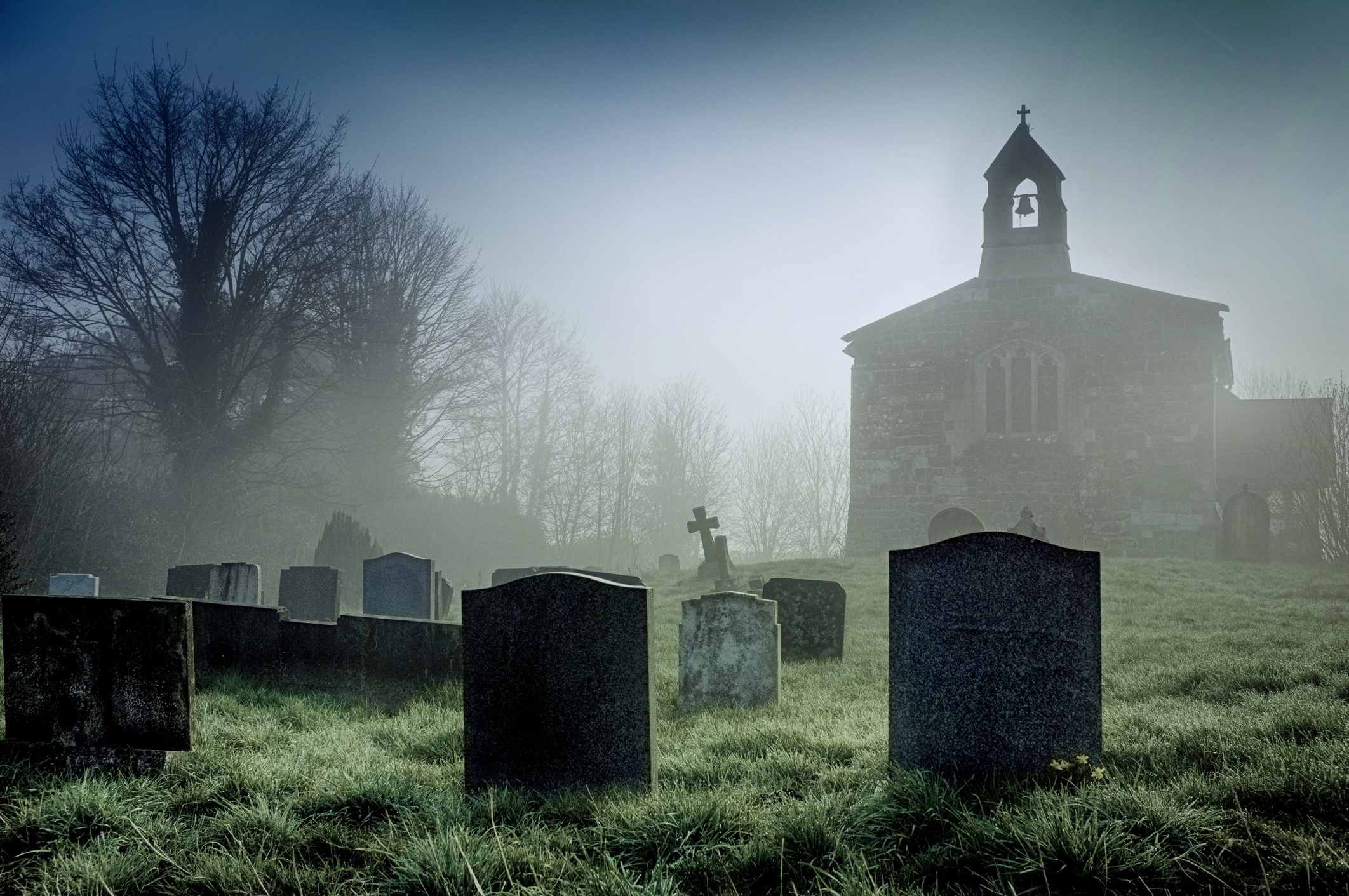 Picture Prompts: Graveyard A misty dawn at a deserted church on the Lincolnshire Wolds, England.
