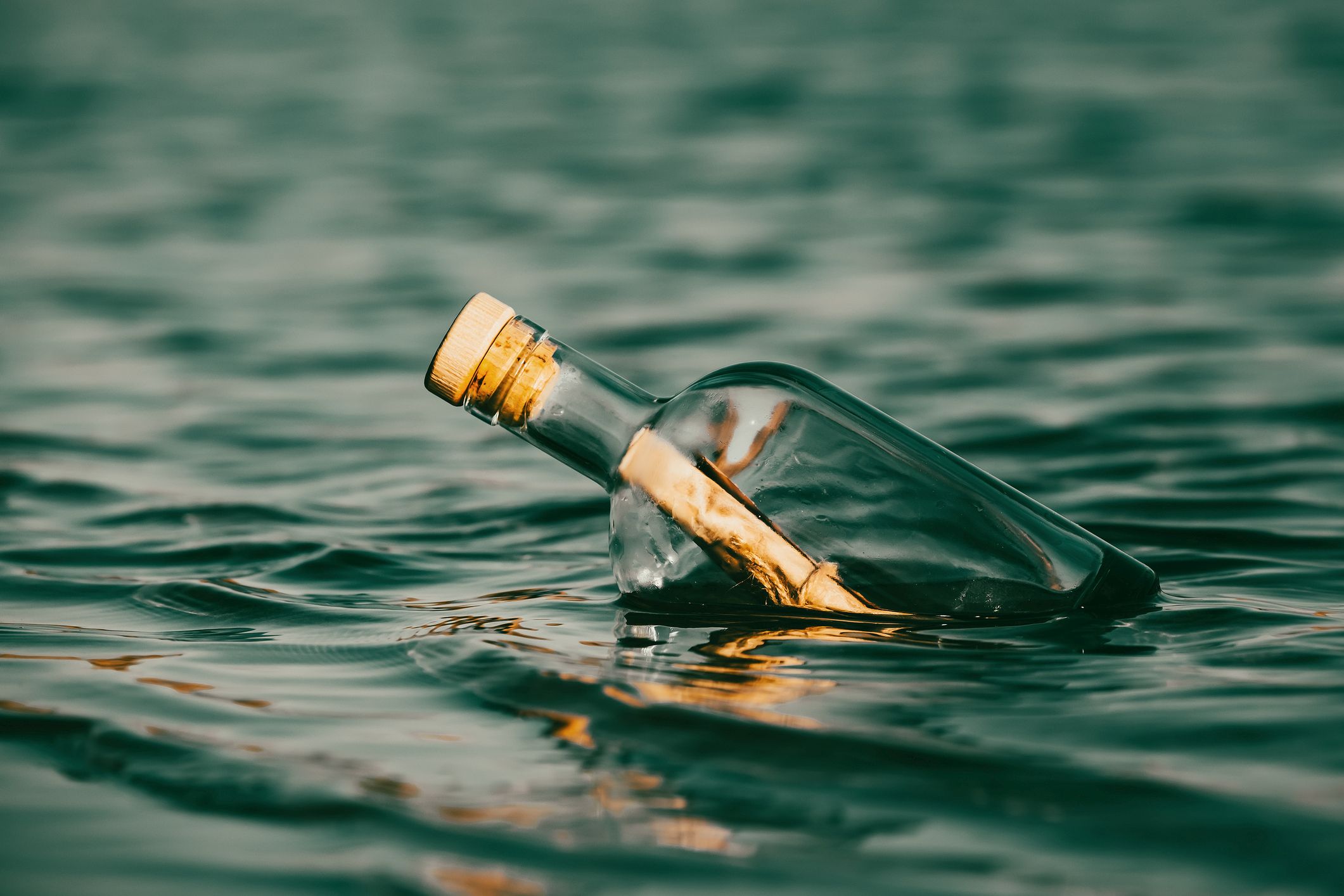 Picture Writing Prompts: Message in a Bottle Message in a bottle floating on the ocean waves.
